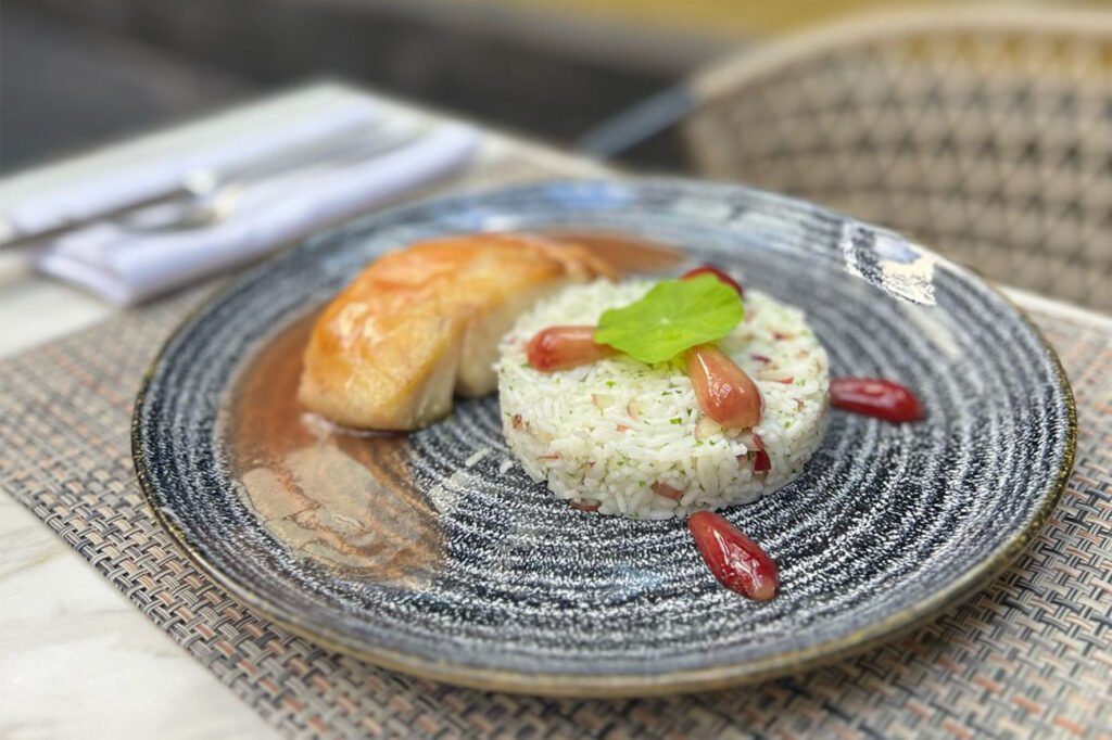 Peixe com arroz de pinhão ao molho de quentão | Foto: Divulgação